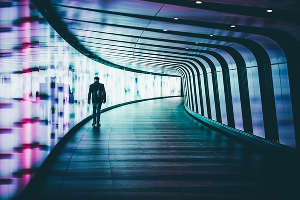 Person walking along corridors. King's Cross, London (UK). Photo: Graeme Worsfold (@worsfold)