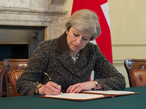 Theresa May, UK Prime Minister, signs Article 50 letter today. Photo: Jay Allen / Number 10 (Crown copyright, CC BY-NC-ND 2.0)