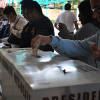 People exercising their right to vote in the 2012 Mexican presidential elections. Photo: ProtoplasmaKid / Wikimedia Commons (CC-BY-SA 4.0)