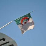 A political economy of low oil prices in Algeria. Algerian flag.