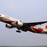 La creciente divergencia en la salud corporativa china. Avión de Air China despega del aeropuerto de Guangzhou.