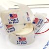 Pegatinas "I voted" en inglés y español para las elecciones en Estados Unidos, noviembre de 2014