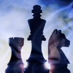 European defence policy. Chess figures with the flag of the European Union in the background