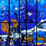Latin America. Photo composition of the stained-glass window “El nacimiento del hombre” by Héctor Poleo, taken in 1995 at the metro station La Paz in Caracas, Venezuela
