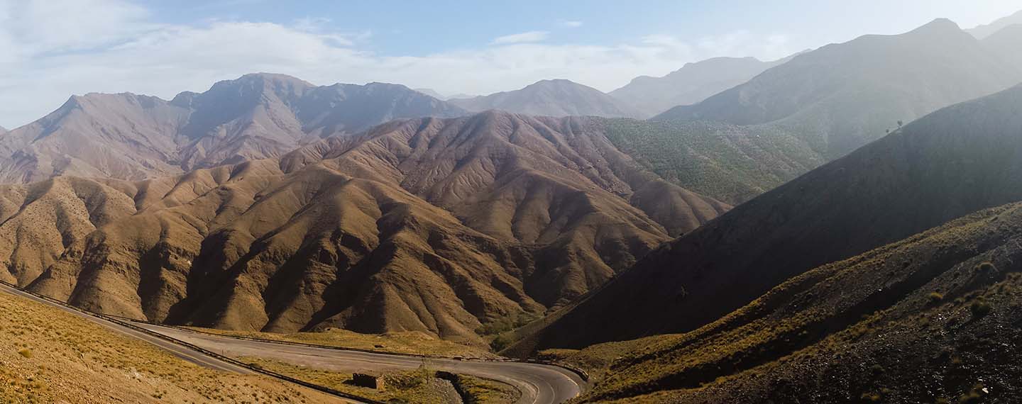 Maghreb. On the way to Aït Benhaddou. The Atlas Mountains is a mountain range across the northwestern stretch of Africa extending about 2,500 km through Algeria, Morocco and Tunisia