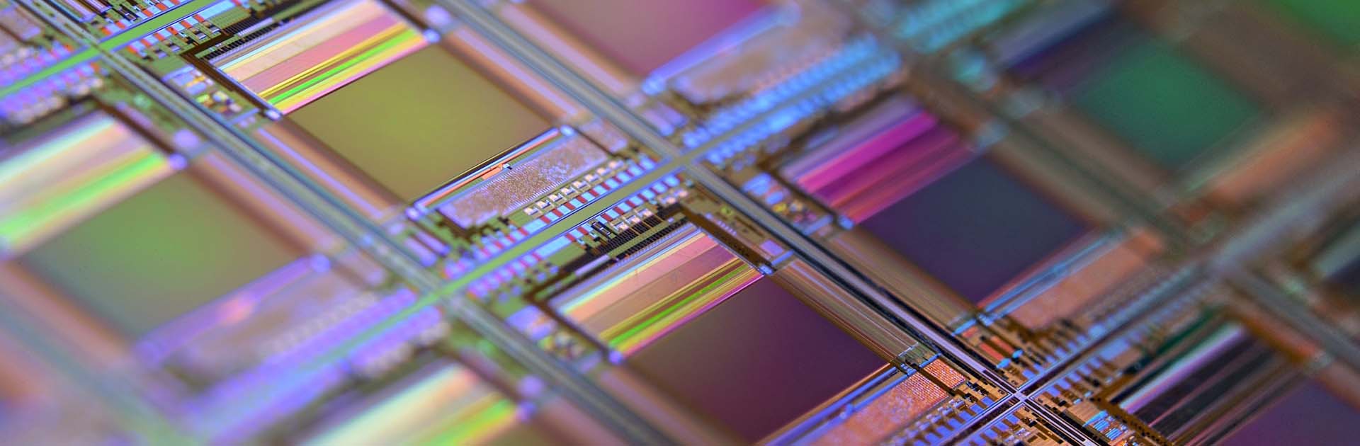 A macro of a silicon wafer. Each square is a chip with microscopic transistors and circuits. Silicon is one of the most widely used semiconductors.