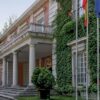 Diagonal view of the façade of the Council of Ministers Pavilion in the Moncloa Complex, with the Spanish and EU flagpoles. Challenges