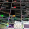 A photograph of a 12-inch semiconductor wafer of microelectronic testbeds