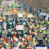 Tens of thousands of people on foot and waving flags, accompanied by more than 100 tractors coming from all the provinces, at the Spanish farmers protest in Madrid on 26 February 2024