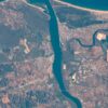 The Guadiana River flows into the Gulf of Cádiz in the Atlantic Ocean and is the border for the southern coastal portions of Portugal (right) and Spain (left).