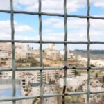 Views of Bethlehem through the fences in the West Bank, Palestine.