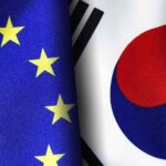 European union and South Korean flags standing side by side