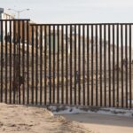 US - Mexico border fence along the Pacific Ocean just south of San Diego. Immigration