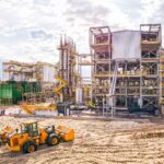 Second-generation ethanol production plant at Bonfim Bioenergy Park, Guariba, São Paulo, with heavy machinery in the foreground. Mercosur-EU agreement