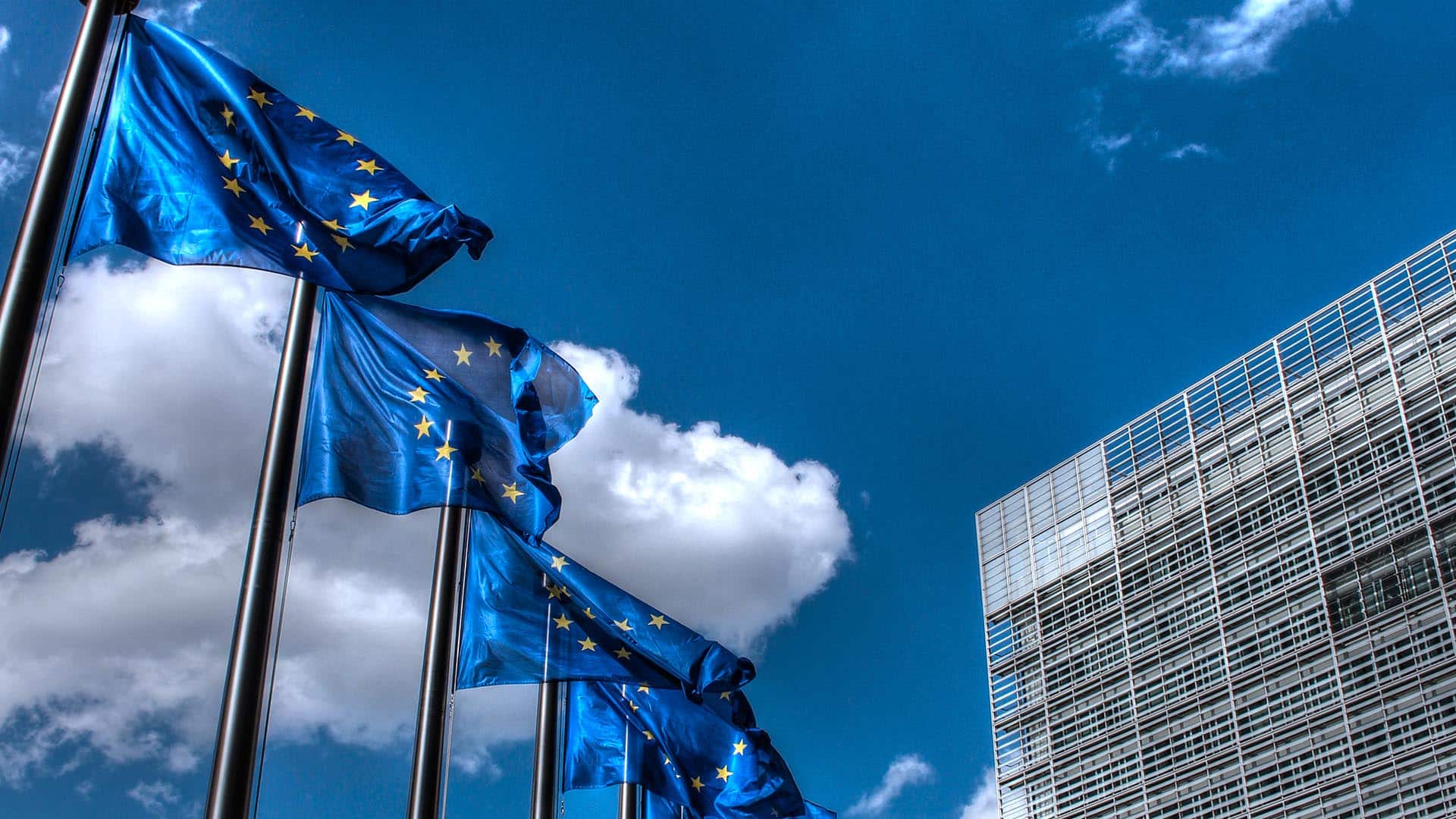 European Union flags at the Berlaymont building in Brussels.